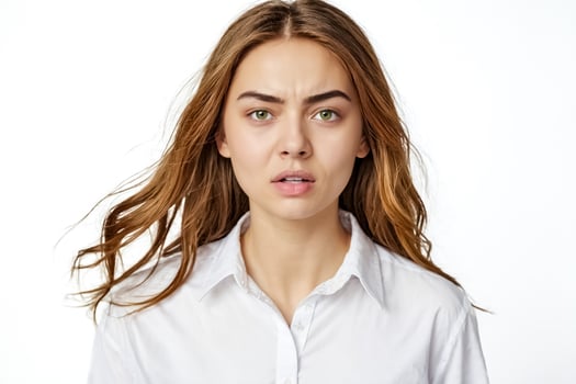 Close-up of a young woman with a surprised expression photo
