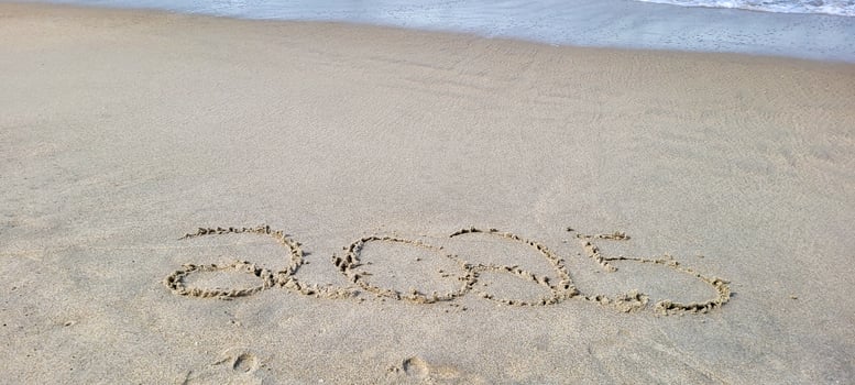 happy 2025 written in the sand of itamambuca ubatuba beach photo