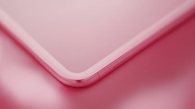 Close-Up View of a Smooth Pink Surface With Rounded Edges Highlighting Modern Minimalist Design Aesthetic photo