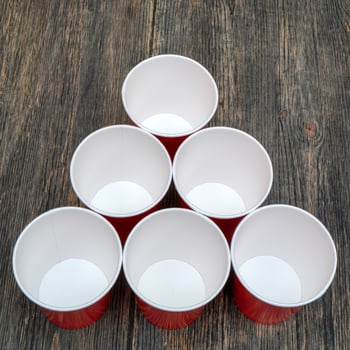 Red disposable paper cups for drinks. photo