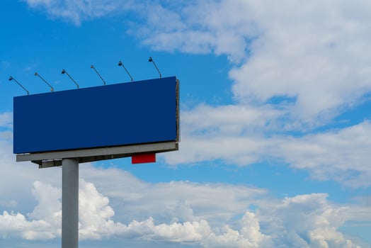 Billboard on pillar against the sky. Empty space for text. photo
