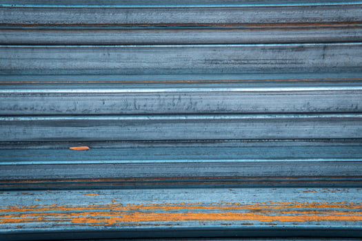Steel bar for construction.Metal pipe profile. Stock photo of metal beams.