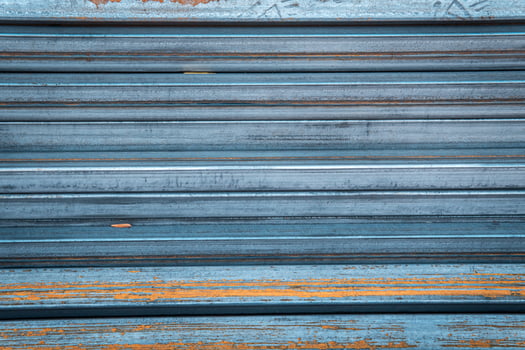 Steel bar for construction.Metal pipe profile. Stock photo of metal beams.