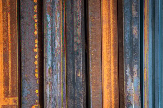 Steel bar for construction.Metal pipe profile. Stock photo of metal beams.