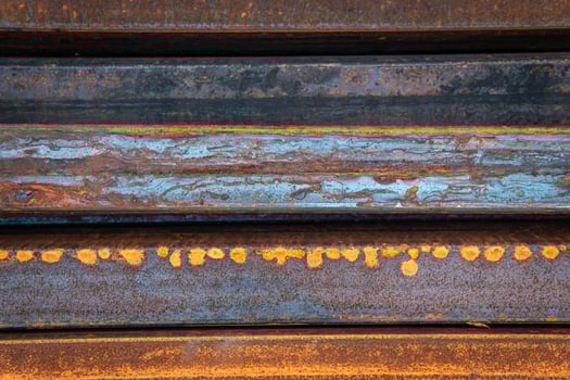 Steel bar for construction.Metal pipe profile. Stock photo of metal beams.