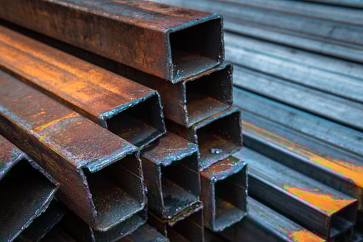 Steel bar for construction.Metal pipe profile. Stock photo of metal beams.