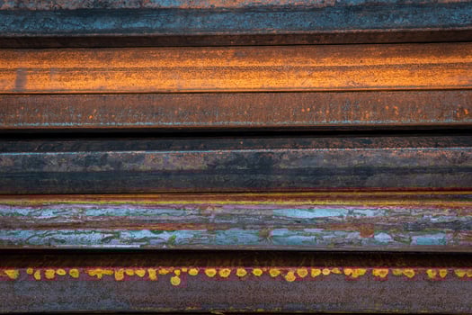 Steel bar for construction.Metal pipe profile. Stock photo of metal beams.