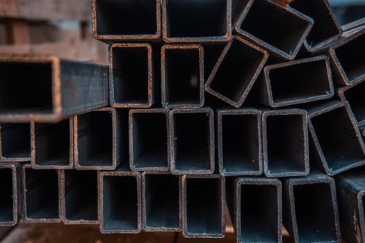 Steel bar for construction.Metal pipe profile. Stock photo of metal beams.