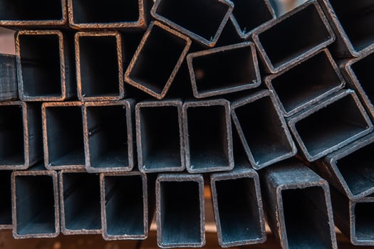 Steel bar for construction.Metal pipe profile. Stock photo of metal beams.