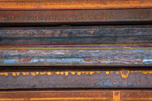 Steel bar for construction.Metal pipe profile. Stock photo of metal beams.