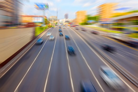 Cars ride on highway. City car traffic. Blur cars in motion. Soft focus background. photo