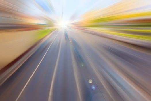Soft focus background. Cars ride on highway. City car traffic. Blur cars in motion. photo