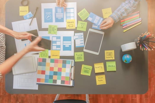 Smooth Focus, group of web designers are working together to develop mobile responsive website with UI UX Front End Designer Previewing. website designers in form of mobile applications with UI UX photo