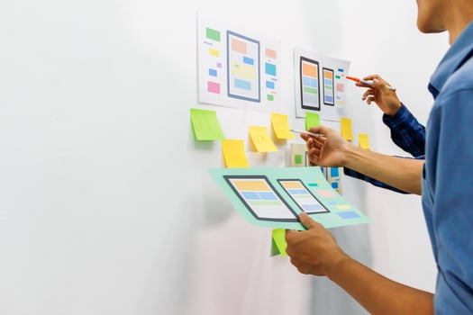 Smooth Focus, group of web designers are working together to develop mobile responsive website with UI UX Front End Designer Previewing. website designers in form of mobile applications with UI UX photo