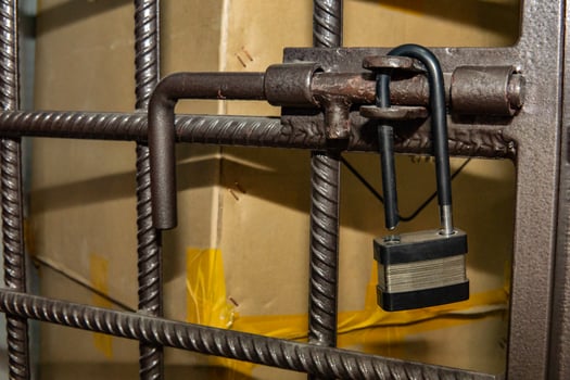 open padlock on the cage photo