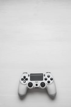 White modern gamepad on background photo