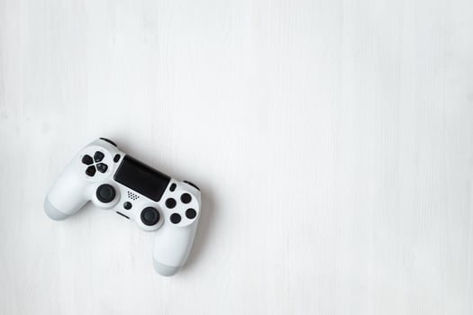 White modern gamepad on background photo