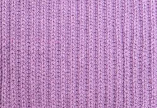 Close-up texture of knitted fabric. Knitted background photo