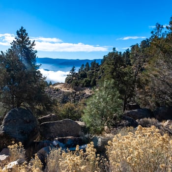 Beautiful mountain scenery on the background of clouds, layers of mountains on the horizon, Sierra Nevada Mountains, California, USA photo