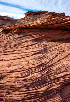 Layered weathered red sandstone rock formations photo