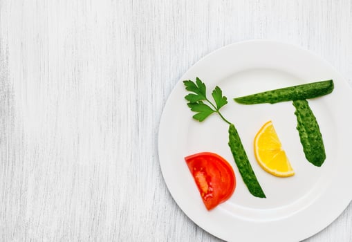 Diet. Word. Vegetables on a white plate. photo