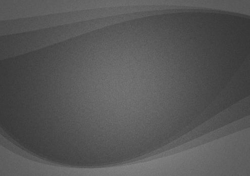 grainy gray background with a bright spot and light waves on the edges photo