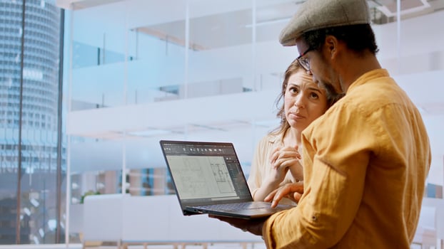 Realtor broker and clients negotiating leasing contract on an office tour, evaluating potential real estate layout for a creative workspace relocation. Reaching a reliable rental agreement. Camera A. photo
