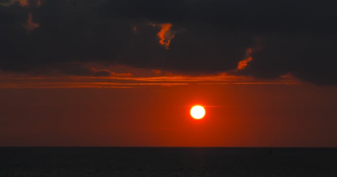 Orange-red sunrise over the Black Sea photo