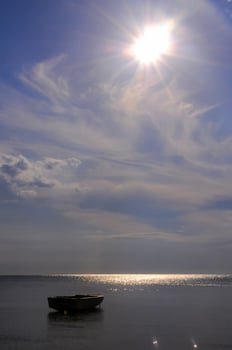 Seascape and boat on the water in eastern Crimea photo