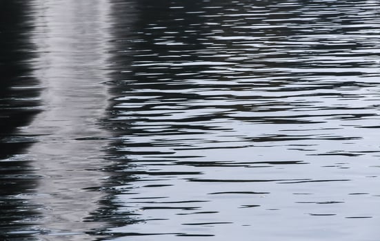 Beautiful glare and reflections in the water of the pond in Sofiyivka park, Uman photo
