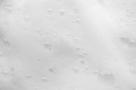 Abstract white soap foam bubbles texture background photo