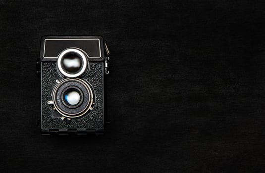 vintage camera on a black photo
