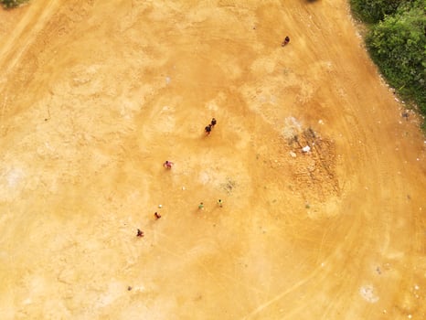Aerial Landscape of football game on barren field. Sports Industry. Panoramic Landscape. Graphic Resources. Above. Drone Photography. Aerial Landscape Photography Concept photo