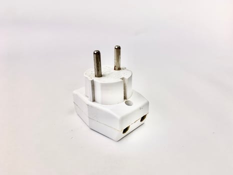 electric plugs at three intersections on a white background. photo