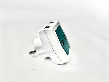 electric plugs at three intersections on a white background. photo