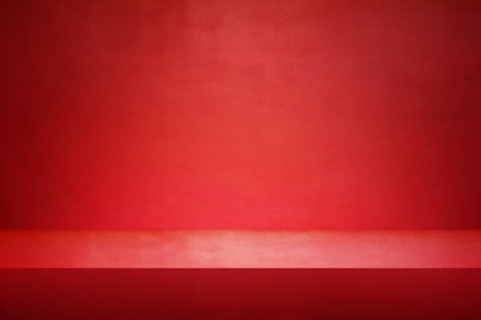 The floor and walls of the room are red as the background. photo