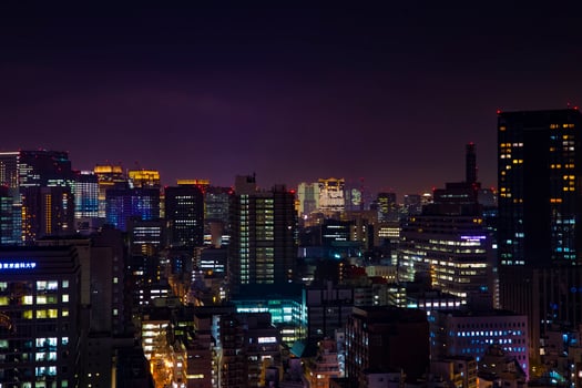 A night cityscape at the urban city in Tokyo long shot photo