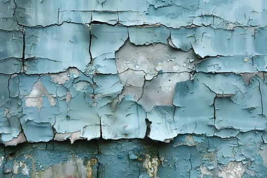 Weathered Blue Peeling Paint Texture on an Old Wall for Background and Design photo