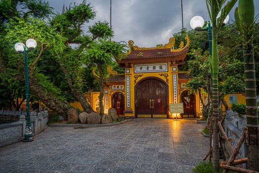 Hanoi, Vietnam - 25 Jun 2024 Tran Quoc Pagoda, the oldest Buddhist temple in Hanoi, is located on a small island near the southeastern shore of West Lake, Hanoi, Vietnam. photo