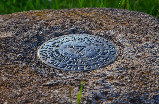AREGON, USA - MAY 02, 2018 - Geodetic survey triangulation among green hills, Aregon, US photo