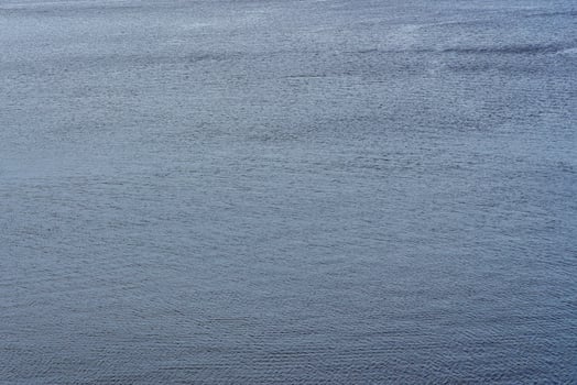 The texture of ripples on the water. Natural background. photo