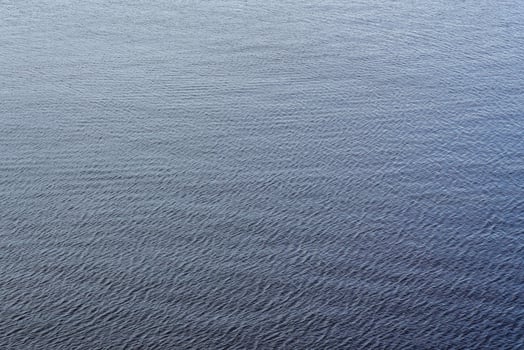 The texture of ripples on the water. Natural background. photo