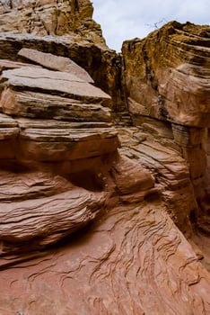 Eroded by water and wind cliffs in the canyon. Little Wild Horse Canyon. San Rafael Swell, Utah photo