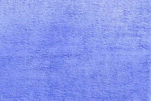 Texture of blue plaster. Interior of a modern loft. Abstract rough background. The facade of an old house. photo