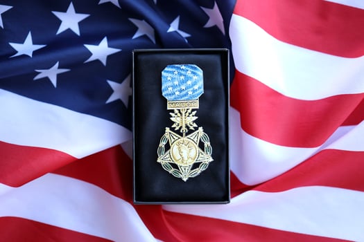 KYIV, UKRAINE - JULY 10, 2024 Air Force Medal Of Honor. Highest United States military award medal with ribbon and pin. Handmade paper theater props photo