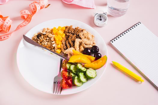 Set of healthy food for individual meal plan on plate on table photo