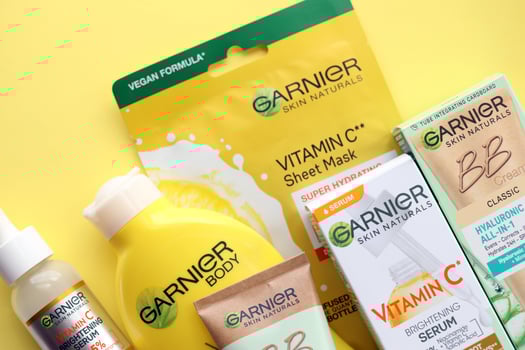 KYIV, UKRAINE - APRIL 20, 2024 Garnier production with company logo. Garnier is a mass market cosmetics brand of French cosmetics company L'Oreal photo