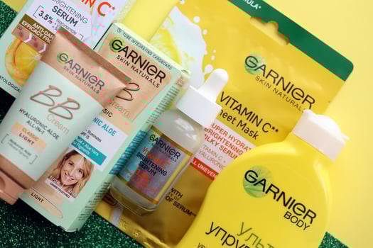 KYIV, UKRAINE - APRIL 20, 2024 Garnier production with company logo. Garnier is a mass market cosmetics brand of French cosmetics company L'Oreal photo