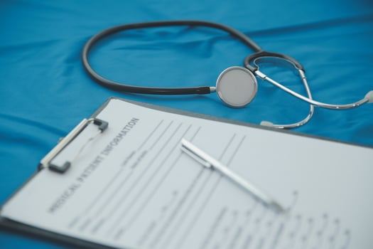 In a hospital setting, the presence of a doctor's physician book and stethoscope carries with it an air of professionalism and dedication to patient care. photo