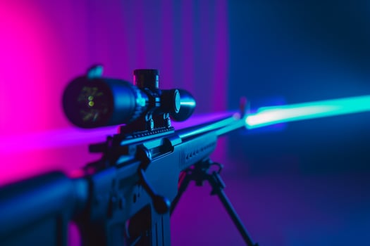 An elegantly designed sleek rifle that showcases vibrant and vivid neon lighting, ideal for tactical and modern themes photo